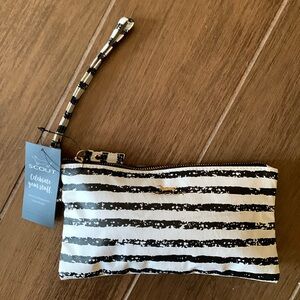 BRAND NEW KATE WRISTLET from SCOUT. Black and white stripes w/white quilt inside